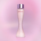 Ghost perfume bottle on a pink gradient background